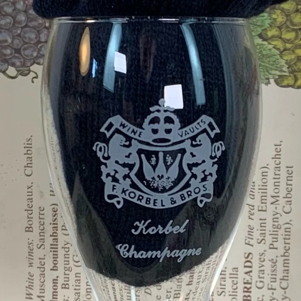A pair of Korbel & Brothers Champagne glass flutes.